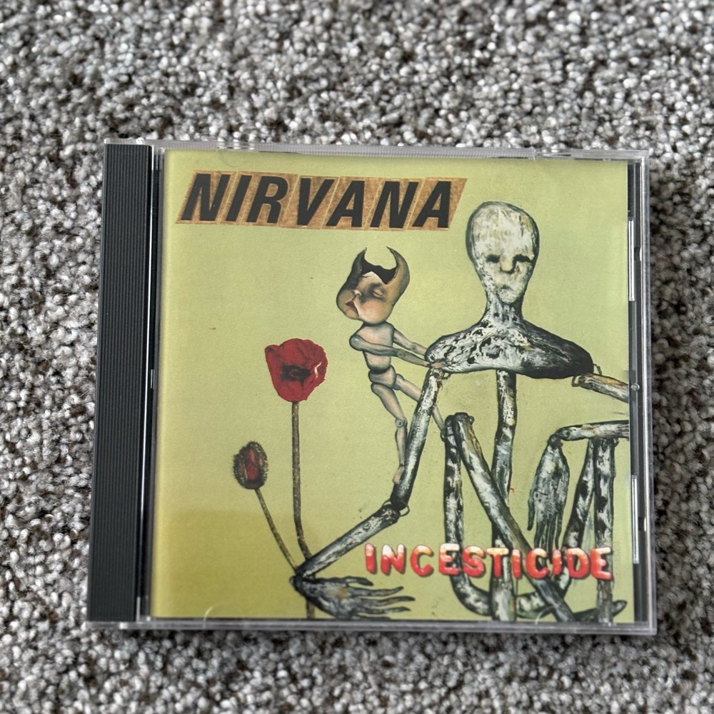 NIRVANA Incesticide CD with Yellow and Red Cover